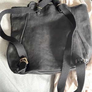 Italy leather backpack.